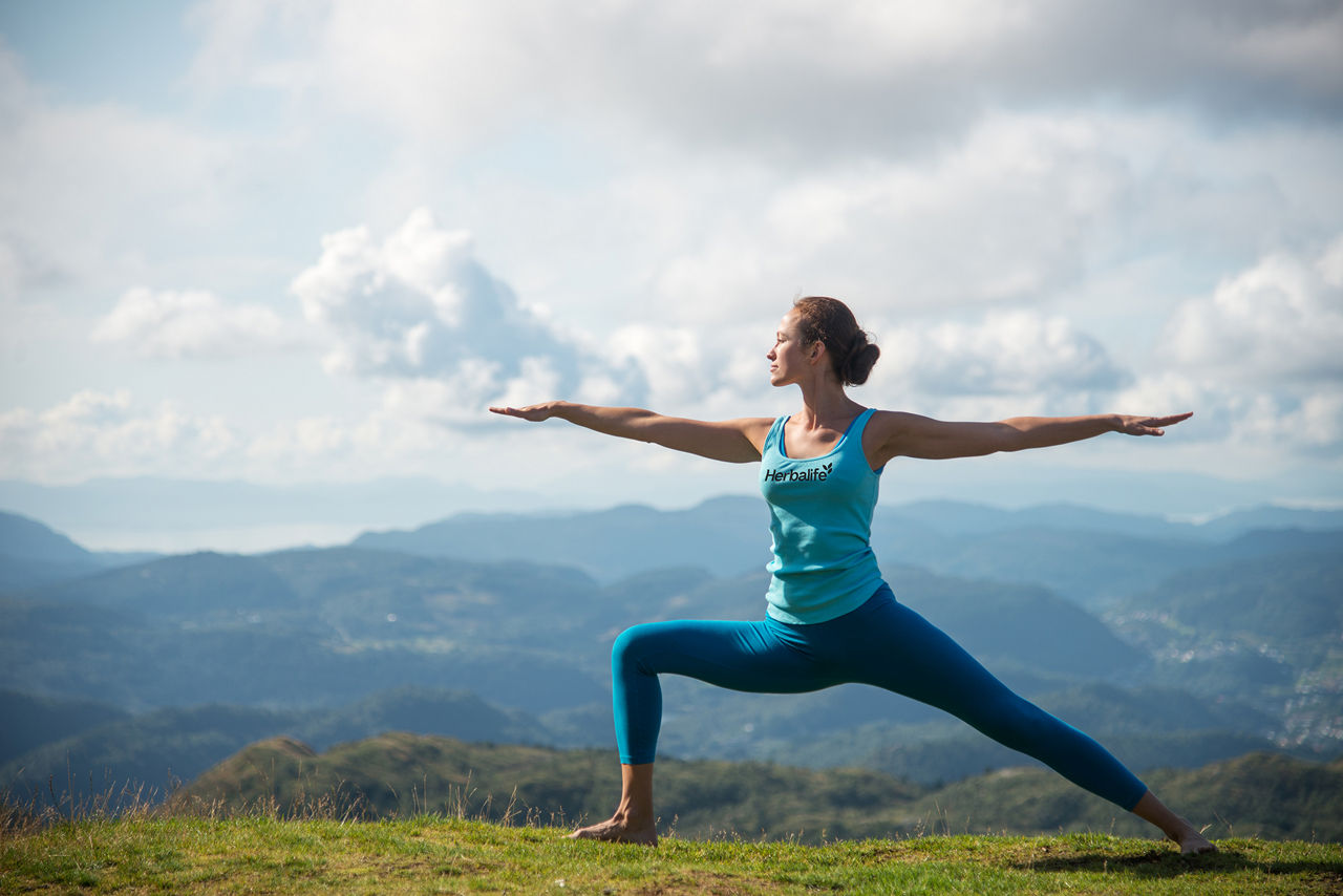 Woman doing yoga outdoors