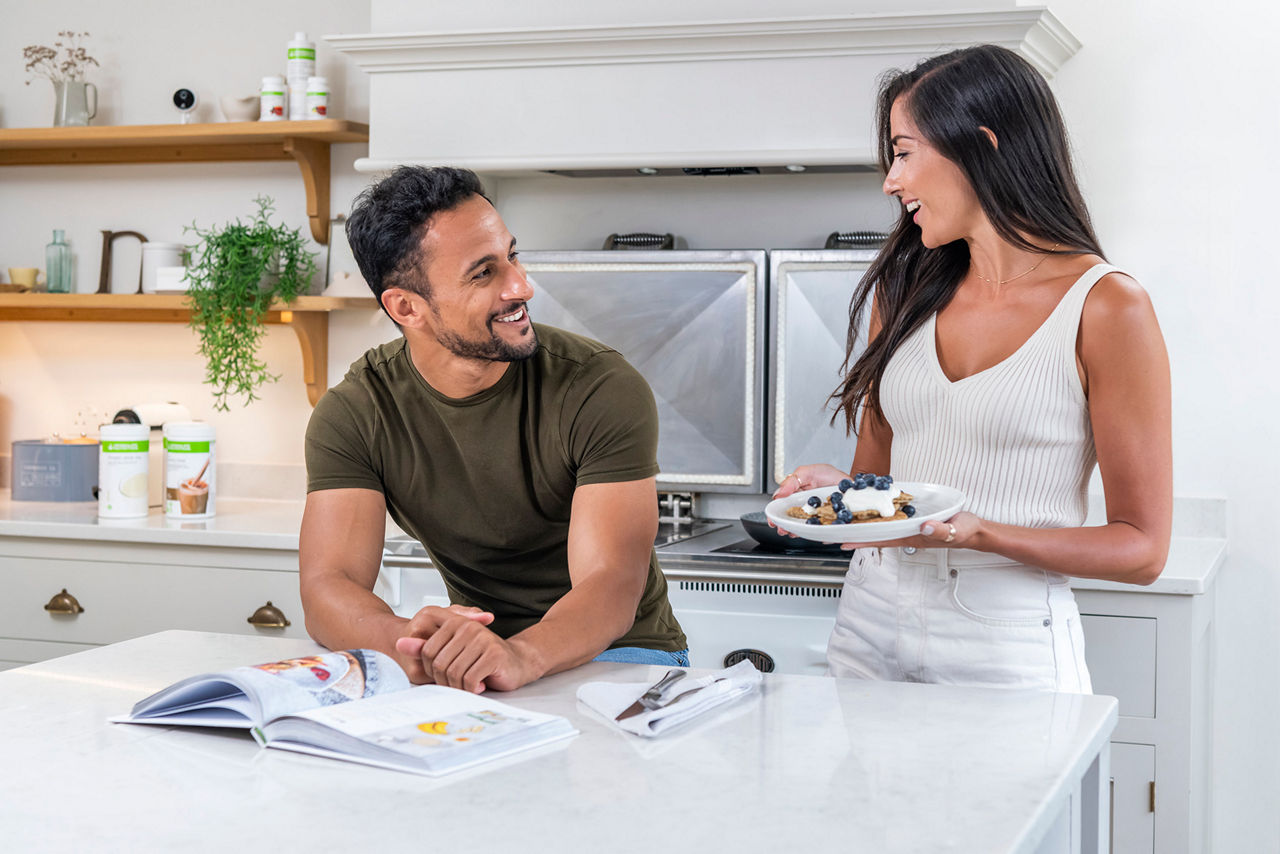 couple cooking kitchen